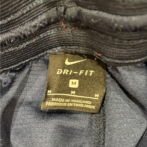 2 Men's Nike Dri-Fit 8" athletic shorts; White/ Gold and Navy/ Red; Size Medium - Picture 4 of 4